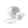 A set of white enamel pots with a floral pattern, displayed on a white background. Podgląd zdjęcia produktu
