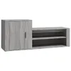A gray wooden shoe cabinet with a single door on the left and open shelves on the right, presented against a white background. Produktbild-Vorschau