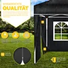 A black pop-up gazebo with a window, set up on a grassy lawn with rain falling. Produktbild-Vorschau