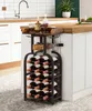 A wine rack with bottles and glasses is placed next to a kitchen island with a sink and countertop. Anteprima dell’immagine prodotto