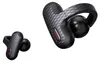 A pair of black wireless earbuds with a textured finish and a red accent is shown against a white background. One earbud is shown in full, while the other is shown partially. Voir les images du produit