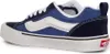 A side view of a blue and navy Vans sneaker. Náhled obrázku produktu