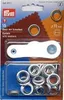 A retail package containing eyelets and a tool for their application. Anteprima dell’immagine prodotto