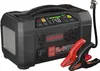 A black jump starter/power bank device with red and black jumper cables attached. Voir les images du produit