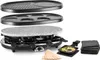 A raclette grill set with multiple cooking surfaces and accessories, displayed against a white background. Náhled obrázku produktu