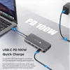 A laptop connected to a USB-C docking station, which is also connected to a power adapter. Produktbild-Vorschau
