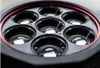 A close-up view of the front of a flashlight with multiple lenses. Podgląd zdjęcia produktu