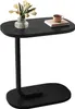 A black side table with a vase of flowers and a cup of coffee on it. Produktbild-Vorschau