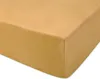 A close-up, angled view of a mustard yellow fitted sheet. Náhled obrázku produktu