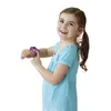A young girl wearing a blue shirt is looking at her pink smartwatch. Podgląd zdjęcia produktu