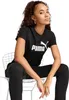A young woman is sitting on a white chair, wearing a black Puma t-shirt and black pants. Anteprima dell’immagine prodotto