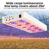 A white LED grow light is suspended over a greenhouse filled with plants. Náhled obrázku produktu