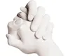 A close-up of two hands clasped together, rendered in a matte white finish. Náhľad obrázku produktu