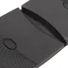 A close-up view of the textured sole of a shoe, showing the material and a small hexagonal detail. Voir les images du produit