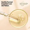 A close-up of a dropper with oil being dispensed into a pool of oil, with text and a logo in the background. Produktbild-Vorschau
