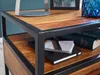 A close-up view of a wooden and metal nightstand with books and a notebook on it. Podgląd zdjęcia produktu