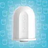 A white BONECO water filter is shown against a light blue background with a repeating pattern of white outlines of filters. Produktbild-Vorschau