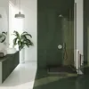 A modern bathroom with a shower and vanity. Produktbild-Vorschau