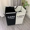 A split laundry basket with 'DARK LAUNDRY' and 'LIGHT LAUNDRY' labels. Anteprima dell’immagine prodotto