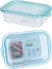 A glass food container with a light blue lid, shown from two angles. Produktbild-Vorschau