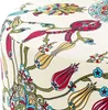 A close-up of a round ottoman with a colorful floral pattern. Produktbild-Vorschau