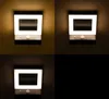 A collage of four images showing a solar-powered outdoor wall light in different lighting conditions. Produktbild-Vorschau