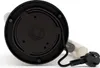 Close-up view of the bottom of a white electric kettle, showing the black base with a power cord and plug. Náhľad obrázku produktu