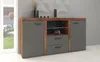 A modern sideboard with two doors and two drawers, set against a grey wall with a window to the left.