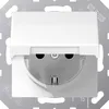 A close-up view of a white electrical outlet with a flip cover, mounted on a metallic plate. Anteprima dell’immagine prodotto