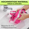 Hands washing a pink safety vest under a running faucet in a white sink. Náhľad obrázku produktu