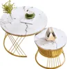 Two round coffee tables with marble-look tops and gold metal frames, displayed on a white background. Náhľad obrázku produktu