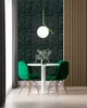A dining set with green chairs and a white table in a modern room with textured dark green walls and wooden paneling. Produktbild-Vorschau