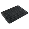 A black silicone dish drying mat with a wavy pattern. Produktbild-Vorschau