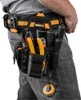 A person wearing a tool belt with various tools. Náhled obrázku produktu