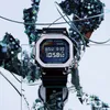 A G-Shock watch is displayed in a surreal, abstract environment with metallic wires and crystalline structures. Produktbild-Vorschau