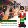 People celebrating with confetti and lights, with an inflatable nutcracker in the foreground. Produktbild-Vorschau