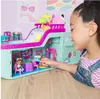 A young girl plays with a toy cruise ship playset. Anteprima dell’immagine prodotto