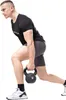 A man is performing a lunge exercise with a kettlebell. Produktbild-Vorschau