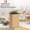 A split image showing a laundry basket in a living room on the left and a dining room on the right, with text and a logo at the top. Produktbild-Vorschau