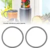 A blender with a cup and ingredients, and two replacement seals. Náhľad obrázku produktu