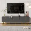 A modern living room setup featuring a TV stand with a television mounted above it.