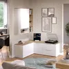 A modern living room with a wall-mounted media unit, a turntable, and decorative items. Náhled obrázku produktu