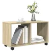 A wooden rolling cabinet with books and a vase of flowers on top. Náhled obrázku produktu