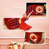 A vintage-style red radio is featured in a collage with a dancing woman and text highlighting its features. Produktbild-Vorschau