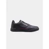 A black Lotto sneaker with red accents is shown against a light gray background. Podgląd zdjęcia produktu