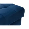 A close-up view of a tufted blue velvet ottoman. Náhľad obrázku produktu