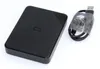 A black external hard drive and its USB cable are shown on a white background. Produktbild-Vorschau
