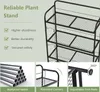 A marketing image showcasing a black metal plant stand with multiple shelves, accompanied by text highlighting its features and close-up shots of its construction. Produktbild-Vorschau
