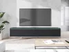 A modern living room with a wall-mounted TV and a sleek TV stand. Náhled obrázku produktu