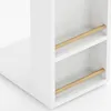 A close-up view of a white side table with wooden dowels on its shelves. Anteprima dell’immagine prodotto